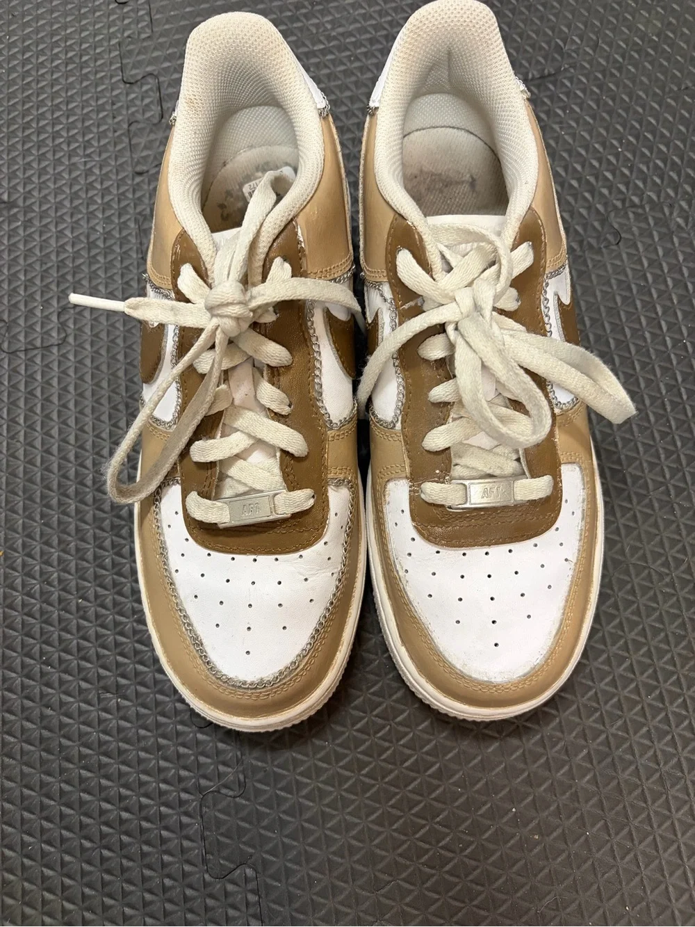 customized Nike Air Force 1 trainers in a beige, brown, and white